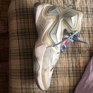 White and blue lebron 13s